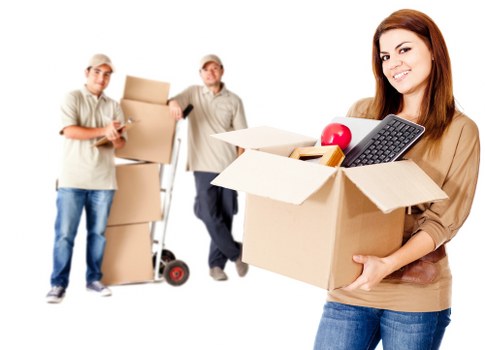 Professional movers handling furniture during a local removal